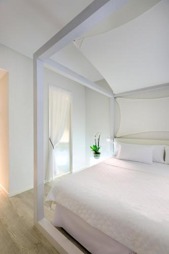 Habitación Doble Superior con terraza del hotel Blanco Formentera. Foto 1