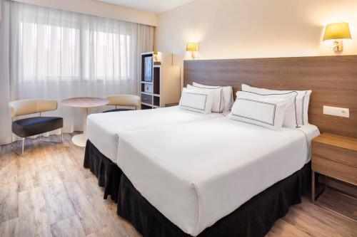 Habitación Doble - 2 camas del hotel Melia Lebreros. Foto 2