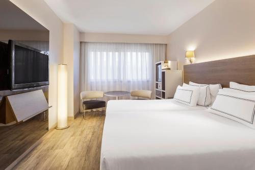 Habitación Doble - 2 camas del hotel Melia Lebreros. Foto 4