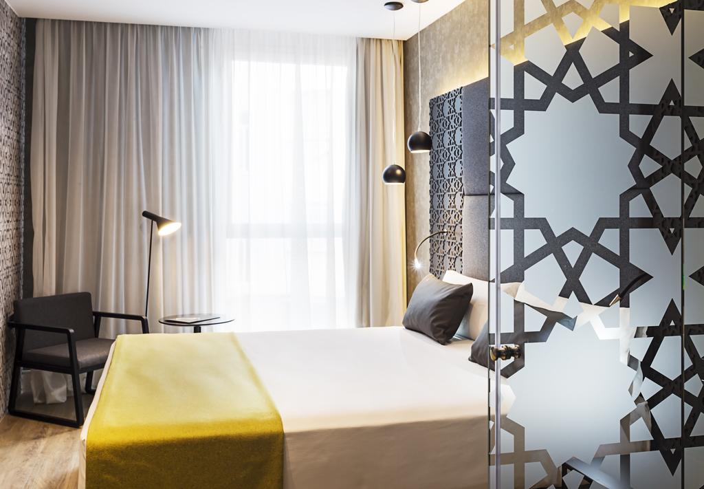 Habitación doble Premium del hotel Catalonia Giralda. Foto 1