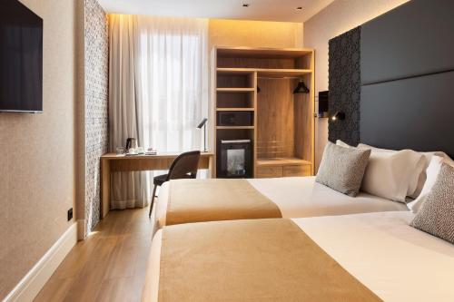 Habitación Doble - 1 o 2 camas del hotel Catalonia Giralda. Foto 7