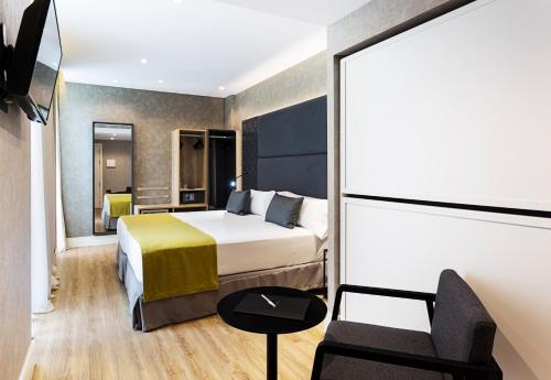 Habitación Familiar del hotel Catalonia Giralda. Foto 3