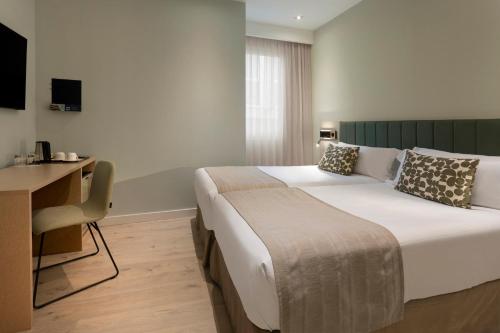 Habitación Doble - 1 o 2 camas del hotel Catalonia Giralda. Foto 4