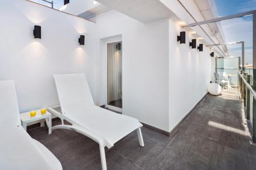 Habitación Familiar con terraza del hotel Catalonia Giralda