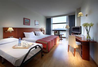 Habitación familiar del hotel Exe Isla Cartuja