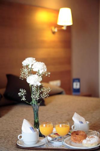 Habitación Doble con cama supletoria - 1 o 2 camas del hotel Don Paco. Foto 4