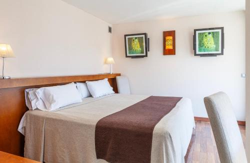 Habitación Doble Premium con balcón del hotel Don Paco. Foto 4