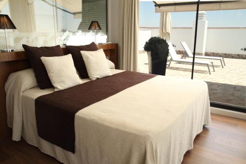 Habitación Doble Premium con terraza y bañera de hidromasaje exterior del hotel Don Paco. Foto 1