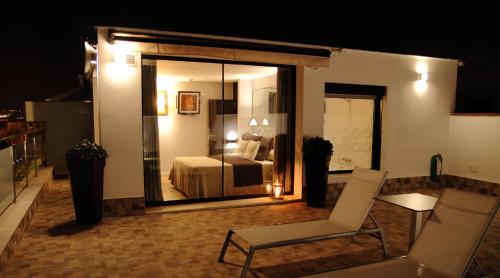 Habitación Doble Premium con terraza y bañera de hidromasaje exterior del hotel Don Paco. Foto 8
