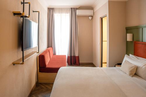 Habitación Doble Deluxe - 1 o 2 camas del hotel The Honest Sevilla. Foto 1