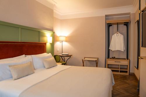 Habitación Doble Deluxe - 1 o 2 camas del hotel The Honest Sevilla. Foto 1