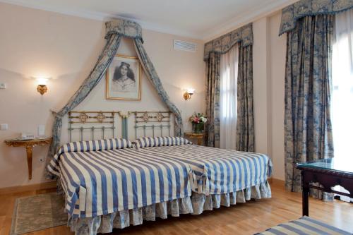 Habitación Doble con cama supletoria - 1 o 2 camas del hotel Doña Maria