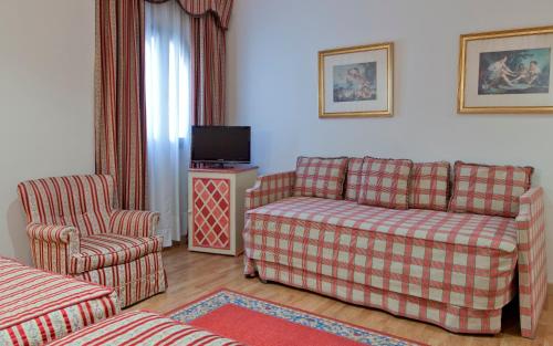 Habitación Doble con cama supletoria - 1 o 2 camas del hotel Doña Maria. Foto 3