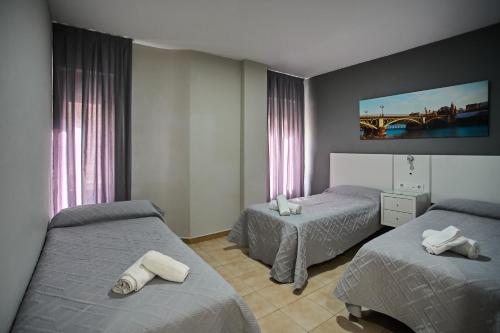Habitación Triple del hotel Resitur. Foto 5