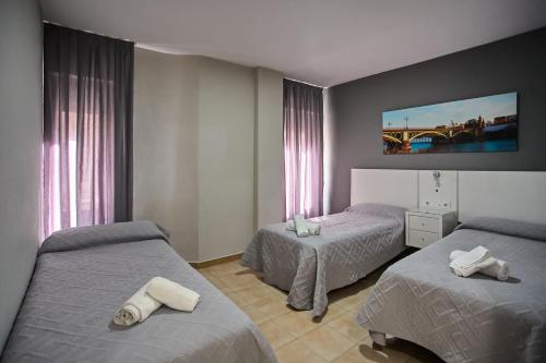 Habitación Triple del hotel Resitur. Foto 14