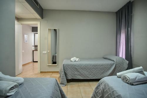 Habitación Triple del hotel Resitur. Foto 15