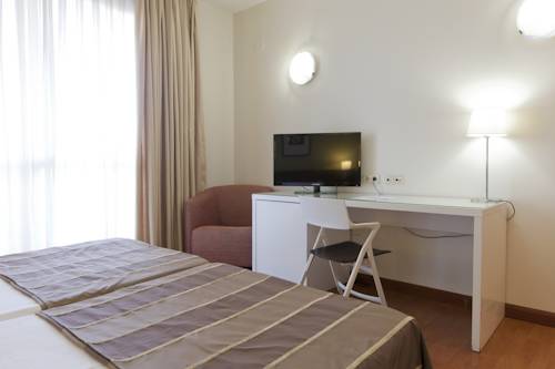 Habitación doble 2 camas del hotel Vertice Sevilla. Foto 2