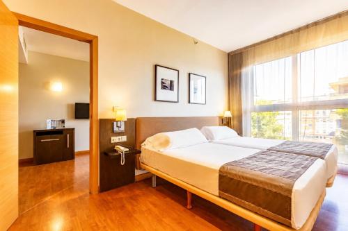 Habitación Familiar del hotel Vertice Sevilla. Foto 3