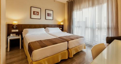 Habitación Doble Estándar - 2 camas del hotel Vertice Sevilla