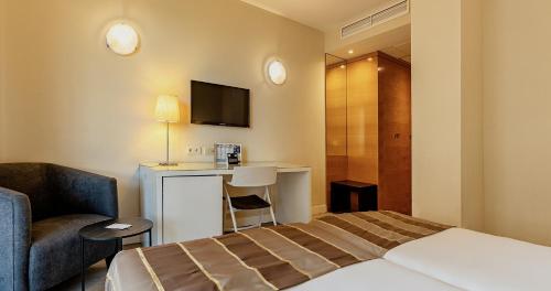 Habitación Doble Estándar - 2 camas del hotel Vertice Sevilla. Foto 1