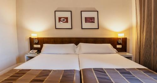 Habitación Doble Estándar - 2 camas del hotel Vertice Sevilla. Foto 3