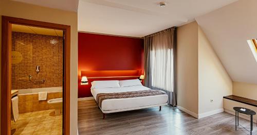 Habitación Doble Deluxe con bañera de hidromasaje - 1 o 2 camas del hotel Vertice Sevilla. Foto 4