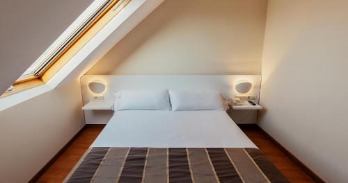 Habitación Individual del hotel Vertice Sevilla. Foto 1