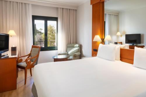 Habitación Doble con vistas a la ciudad - 1 o 2 camas del hotel Exe Sevilla Macarena. Foto 5