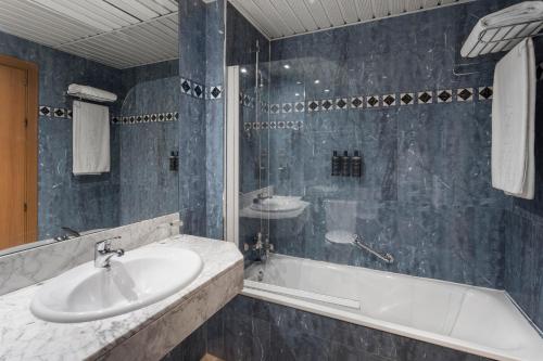 Habitación Familiar del hotel Exe Sevilla Macarena. Foto 5