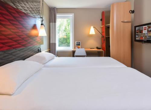 Habitación Doble - 2 camas del hotel Ibis Brussels Erasmus. Foto 8