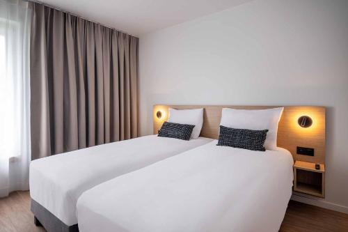 Habitación Doble Deluxe - 2 camas del hotel Jill Brussels. Foto 9