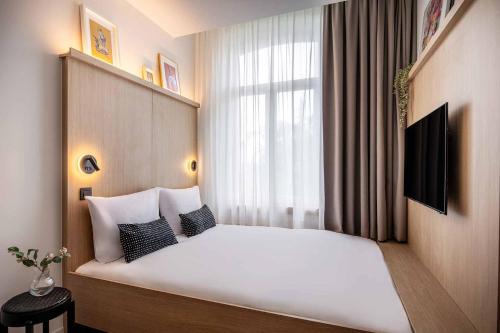Habitación Doble Pequeña del hotel Jill Brussels. Foto 9