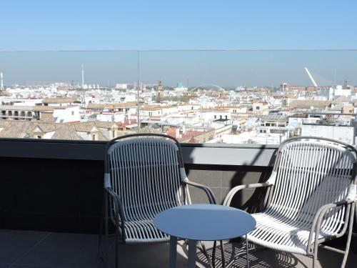 Habitación doble Balcón o Terraza Vista ciudad Con Vistas del hotel America. Foto 6