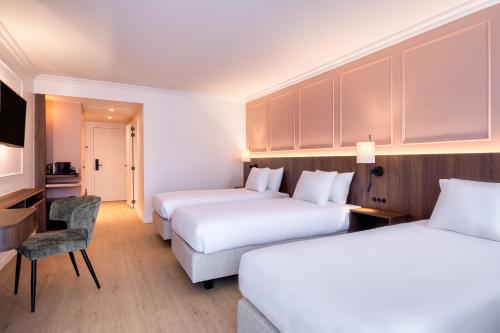 Habitación Triple Superior del hotel Golden Tulip De' Medici. Foto 1