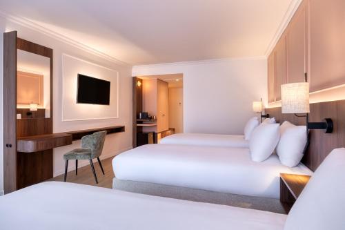 Habitación Triple Superior del hotel Golden Tulip De' Medici. Foto 6