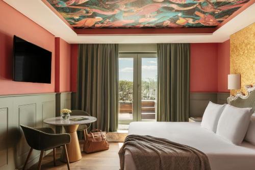 Habitación Premier Red Level con terraza del hotel Colón Gran Meliá. Foto 7