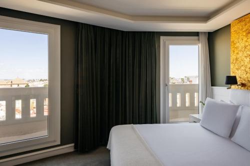 Habitación Supreme con vistas a la ciudad del hotel Colón Gran Meliá. Foto 34