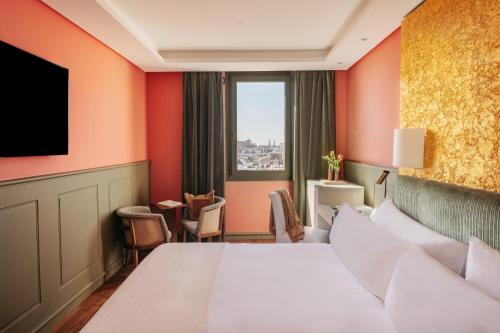 Habitación Red Level con vistas a la ciudad y a la catedral del hotel Colón Gran Meliá