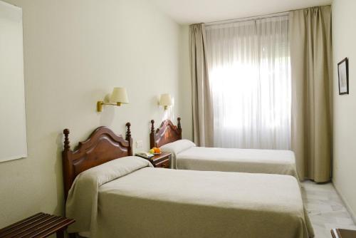 Habitación Triple del hotel San Pablo Sevilla. Foto 4