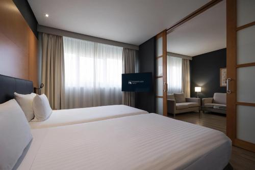 Junior suite Con Vistas 2 Camas dobles del hotel Eurostars Al-Andalus Palace. Foto 3