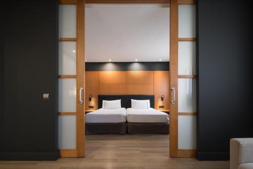 Junior suite Con Vistas 2 Camas dobles del hotel Eurostars Al-Andalus Palace. Foto 6