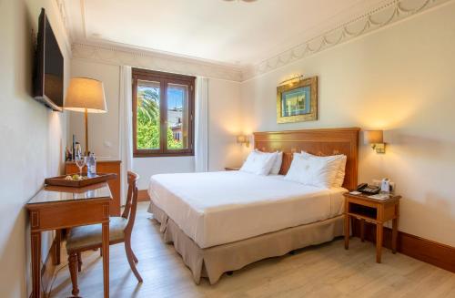 Habitación Doble con vistas a la ciudad - 1 o 2 camas del hotel Inglaterra. Foto 1