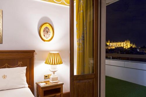 Habitación Doble Deluxe con terraza del hotel Inglaterra. Foto 3