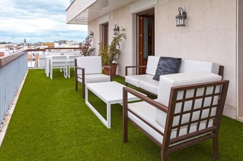Habitación Doble Deluxe con terraza del hotel Inglaterra. Foto 5