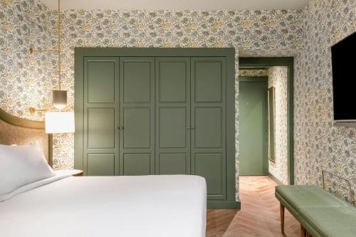 Habitación Deluxe con 1 cama extragrande o 2 individuales del hotel Ac Ciudad De Sevilla By Marriott. Foto 1