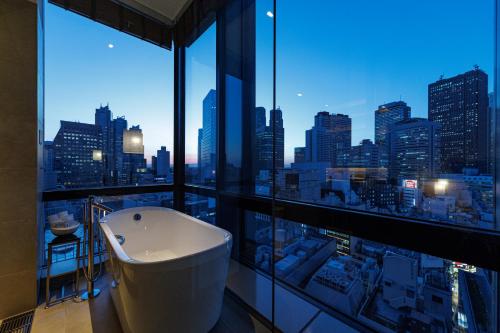 Habitación Premium con 2 camas individuales y vistas desde el baño (plantas 15 y 16) - No fumadores del hotel Jr Kyushu Blossom Shinjuku