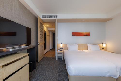 Habitación Premium con 2 camas individuales y vistas desde el baño (plantas 15 y 16) - No fumadores del hotel Jr Kyushu Blossom Shinjuku. Foto 5