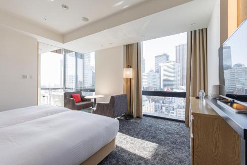 Habitación Premium con 2 camas individuales y vistas desde el baño (plantas 15 y 16) - No fumadores del hotel Jr Kyushu Blossom Shinjuku. Foto 7