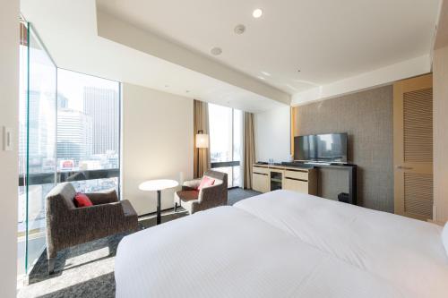 Habitación Premium con 2 camas individuales y vistas desde el baño (plantas 15 y 16) - No fumadores del hotel Jr Kyushu Blossom Shinjuku. Foto 10