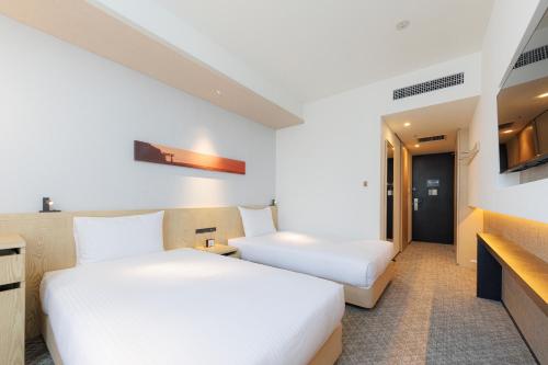 Habitación Doble Superior para no fumadores - 2 camas del hotel Jr Kyushu Blossom Shinjuku. Foto 2